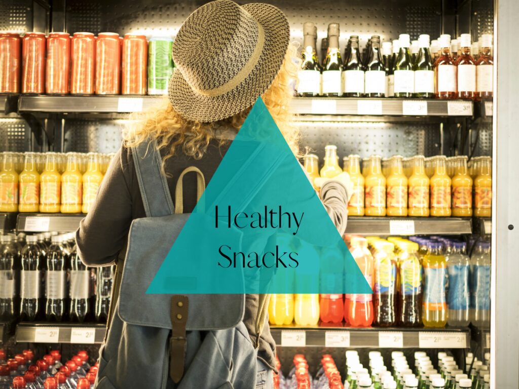 Savvy blonde picking out healthy snacks and drinks 
