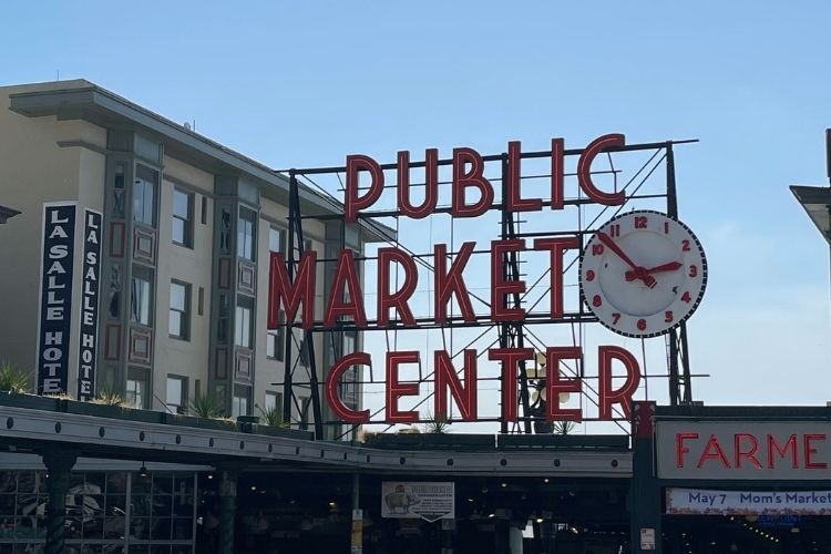 Pike Place Market with Sign Public Market Center during day time.