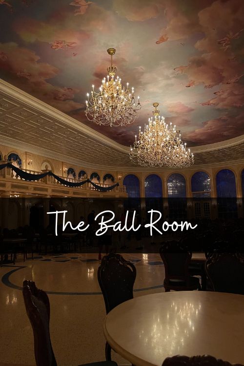 The ballroom a royal dining room that is decorated with painting ceiling of clouds and angels and hanging glass chandeliers