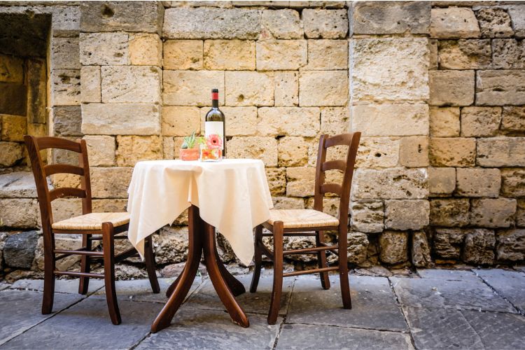 outdoor eating area at italian restaurant in italy