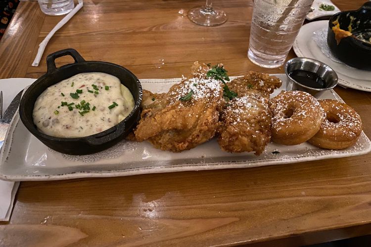 disney springs homecomin kitchen chicken dish with donuts