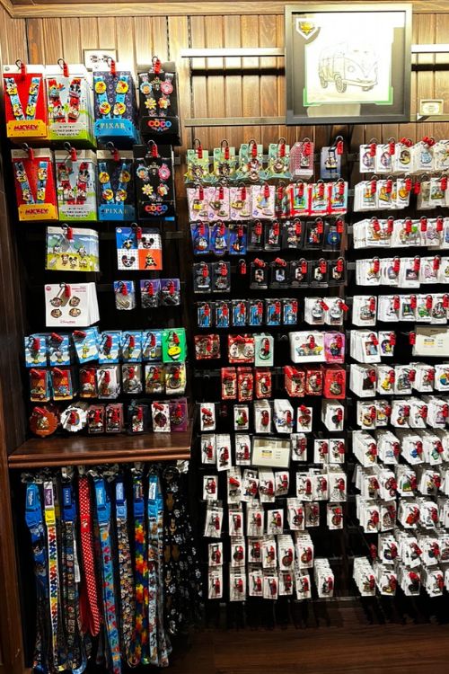 a bunch Disney Pin Start Packs And lanyards at the disney store