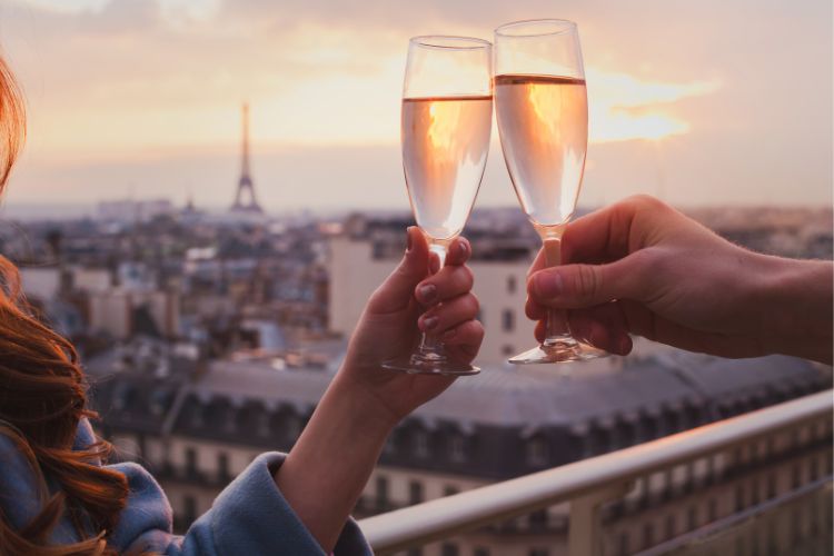couple with champagne in Paris