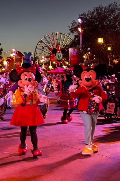 Mickey Mouse and Minnie Mouse in a parade