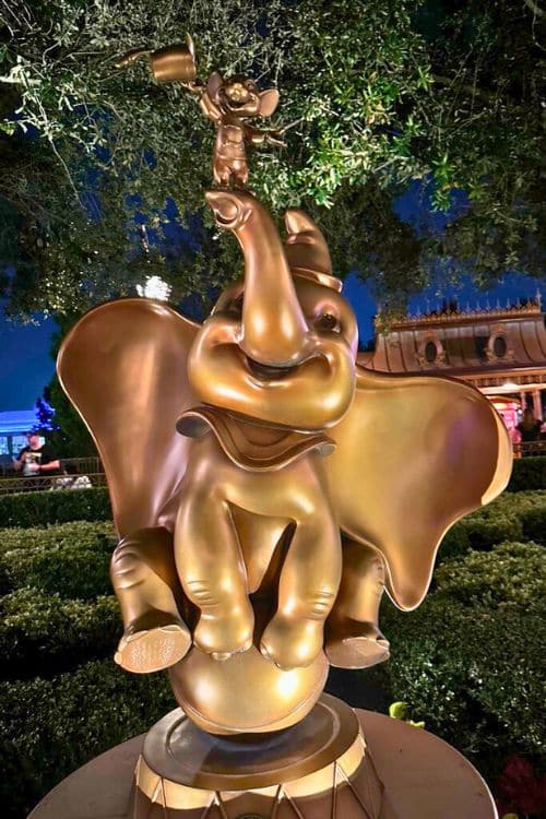 Dumbo and Timothy Q. Mouse Gold statue at Disney World
